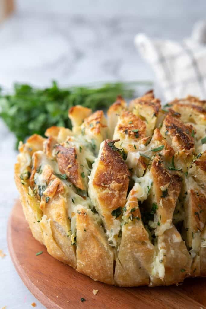 Baked garlic cheese bread made with crusty sourdough loaf