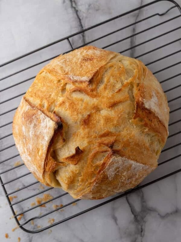 croissant sourdough bread recipe cooling on a rack