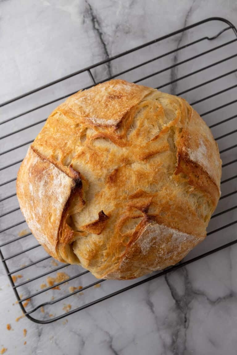 croissant sourdough bread recipe cooling on a rack