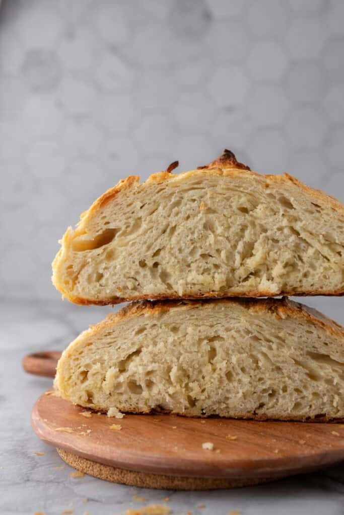 croissant sourdough bread recipe halves stacked on top of each other