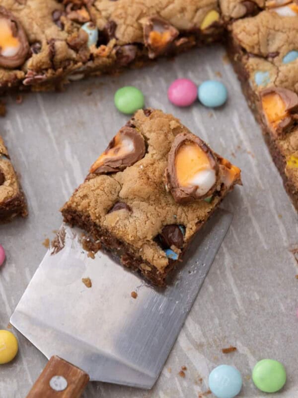 Cadbury Egg Chocolate Chip Easter Cookie Bar on a spatula