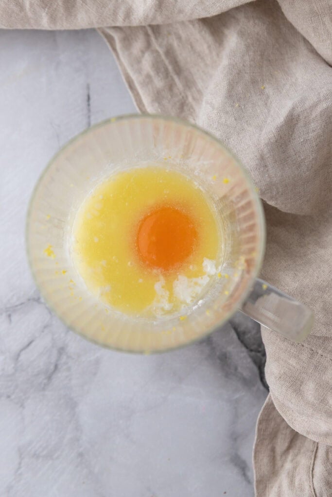 wet ingredients and dry ingredients in a mug