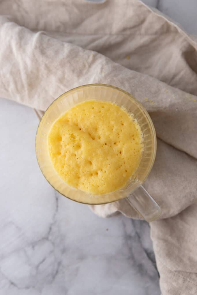 baked batter in a mug