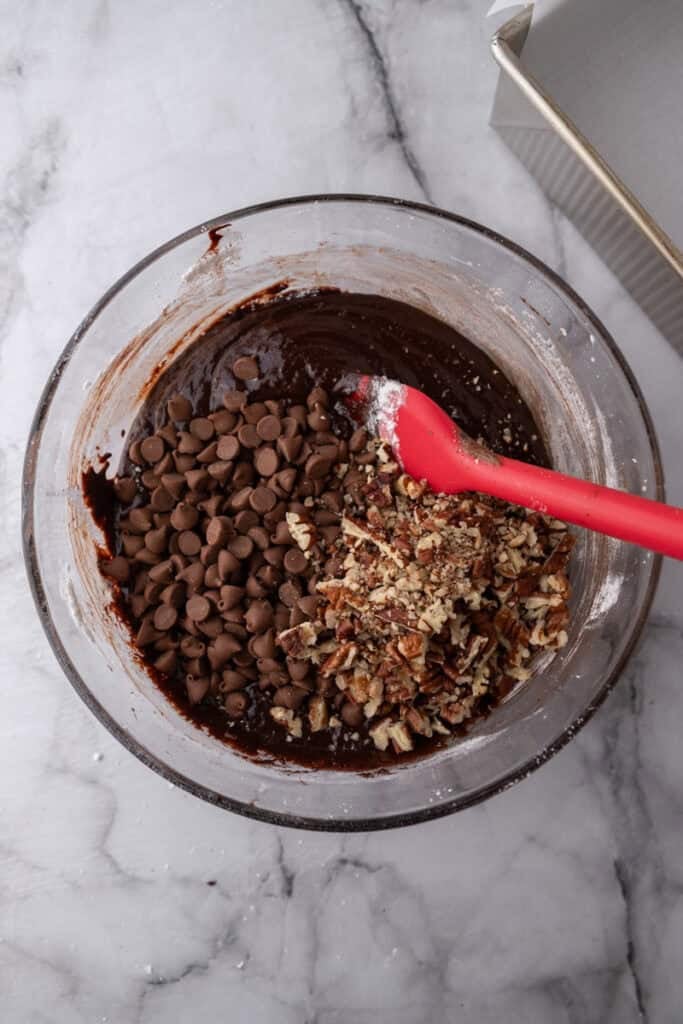 Brownie batter with chocolate chips and nuts