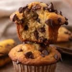 Banana Chocolate Chip Muffins stacked on top of each other