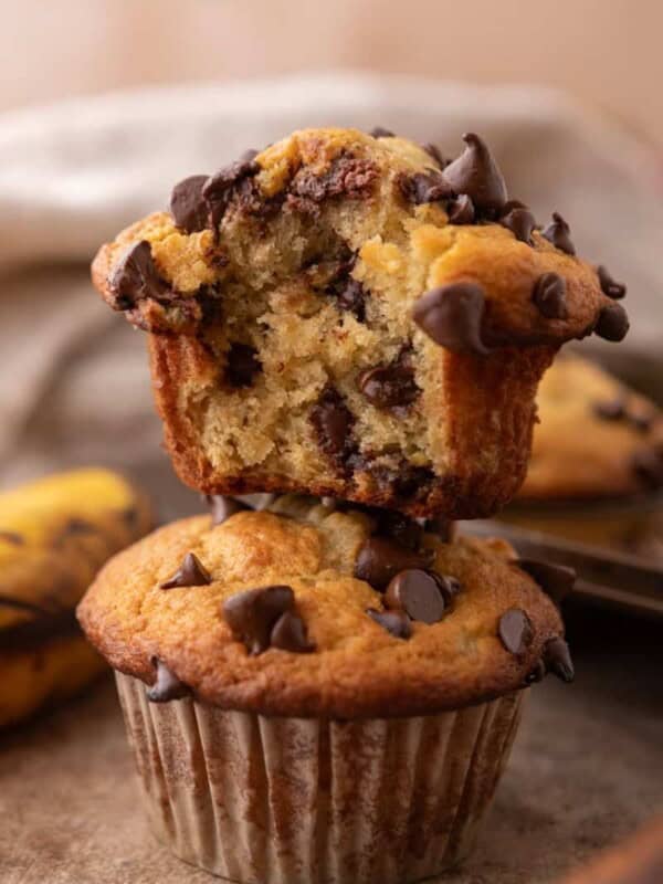 Banana Chocolate Chip Muffins stacked on top of each other