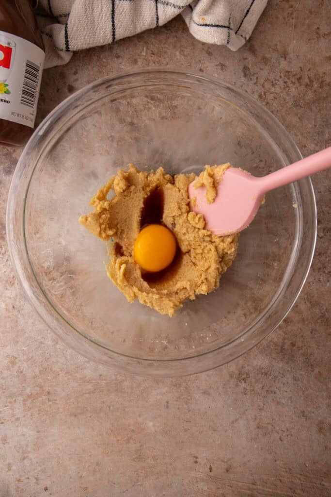Butter, brown sugar, and granulated sugar in a bowl to make cookie dough