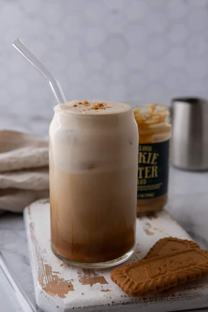 Homemade iced cookie butter latte with Biscoff cookies and cold foam, a Starbucks copycat coffee drink for Mother's Day brunch