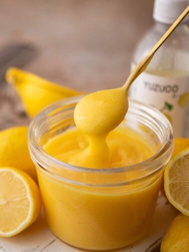 Yuzu Curd Recipe in a jar with a spoon