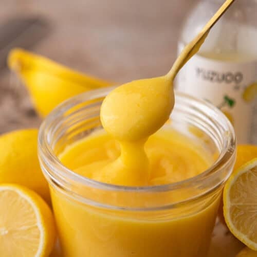 Yuzu Curd Recipe in a jar with a spoon