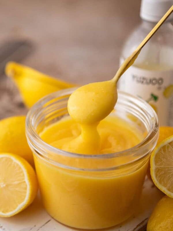 Yuzu Curd Recipe in a jar with a spoon