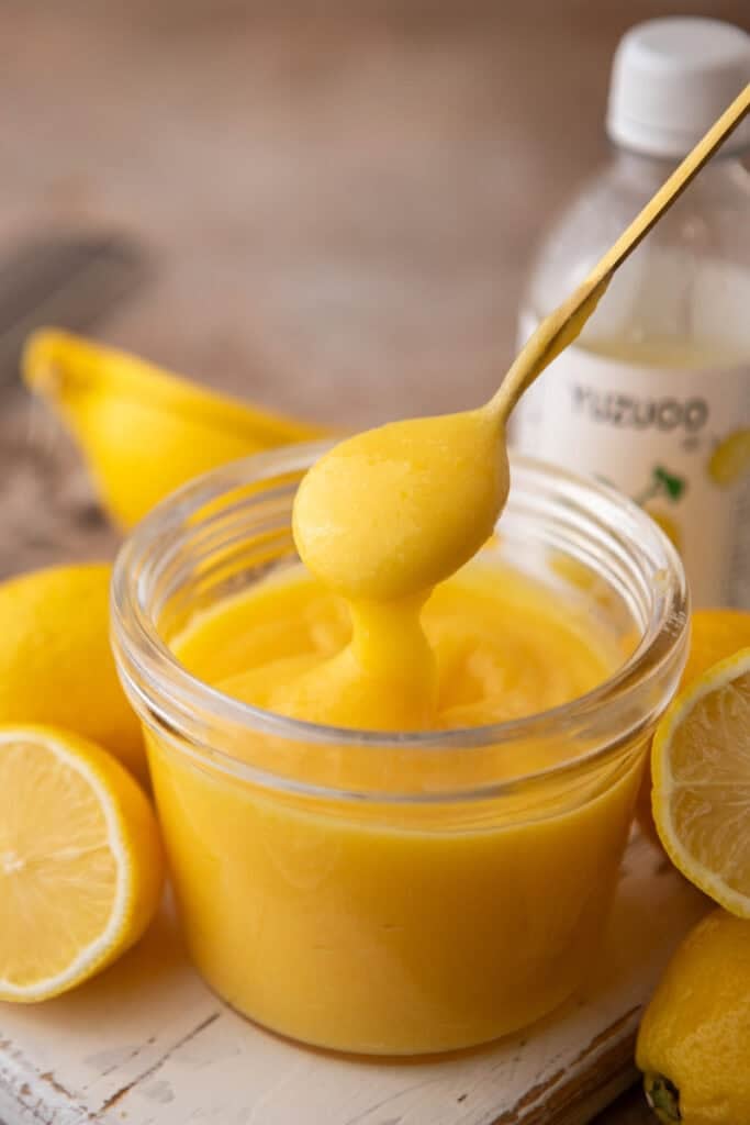 Yuzu Curd Recipe in a jar with a spoon