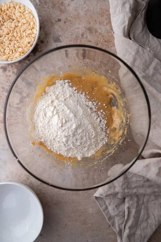 Wet ingredients with flour in a bowl