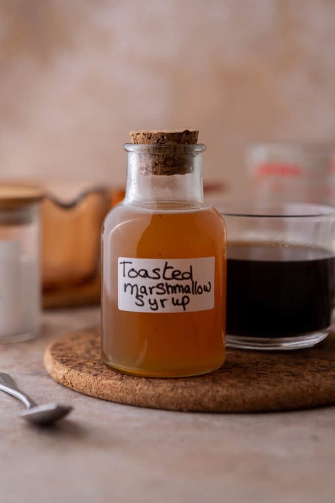 Homemade toasted marshmallow syrup recipe in a jar