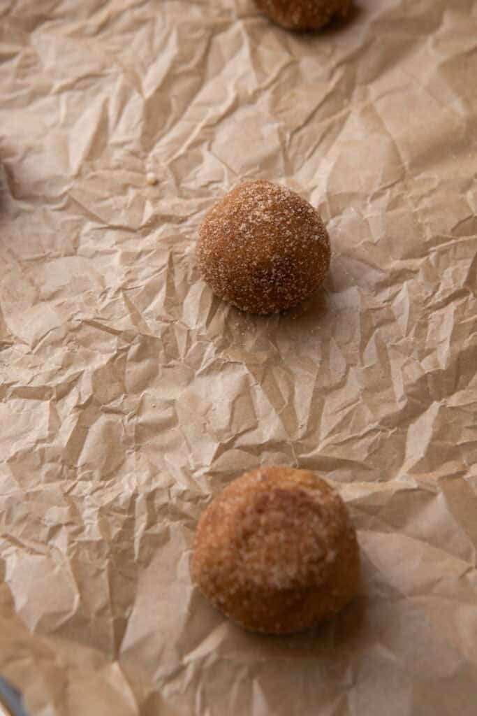 dough balls on a baking sheet