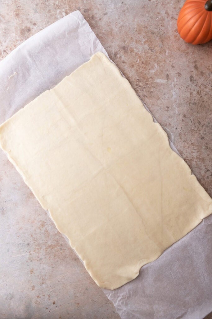 can of dough rolled out