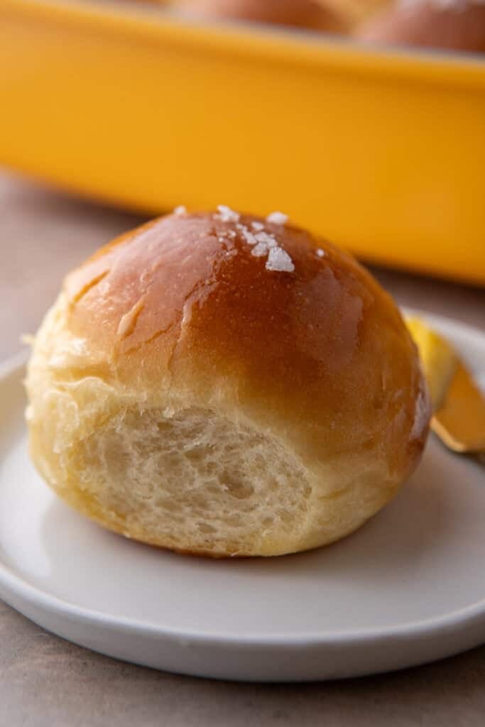 Close up of homemade dinner rolls on a plate