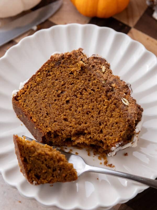 streusel pumpkin bread slice on a plate