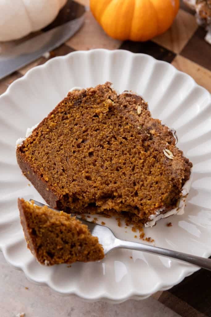 streusel pumpkin bread slice on a plate