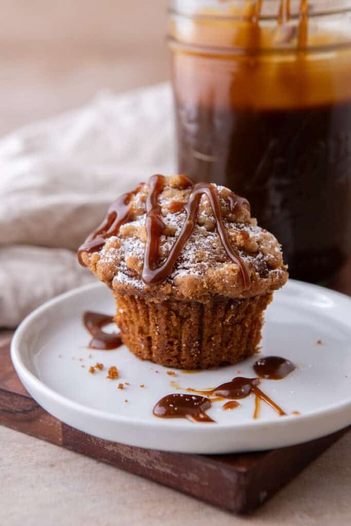 Butterscotch sauce drizzled over a muffin.