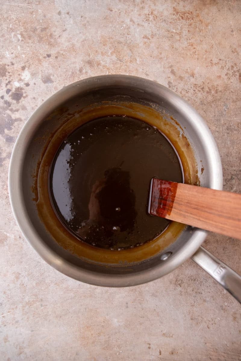 Making butterscotch sauce in a saucepan, step 4.