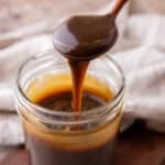 Butterscotch Sauce Recipe in a jar and a spoon