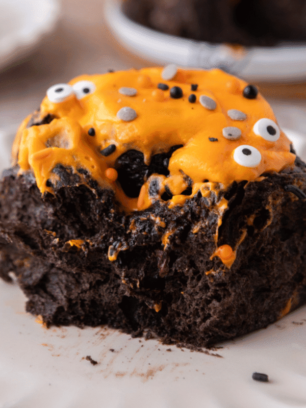 Halloween Black Cocoa Cinnamon Roll on a plate