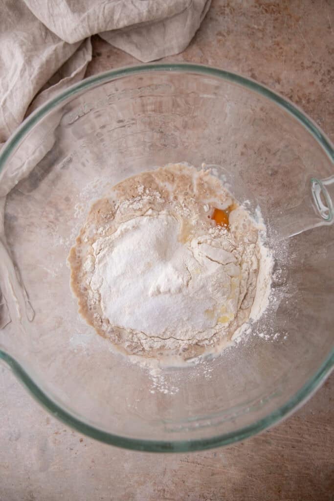 Shaggy hoagie roll dough after adding eggs and flour to the yeast mixture.