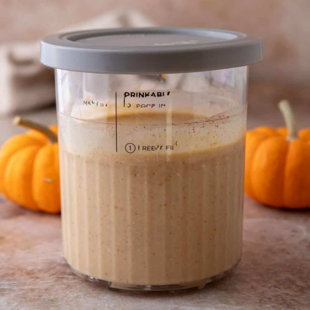 Ninja Creami Pumpkin Ice Cream with Cottage Cheese in the ninja creami pint container