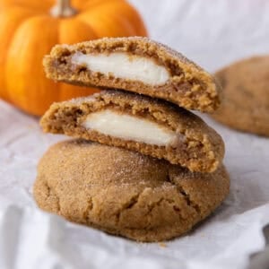 Pumpkin Cheesecake Cookies stacked on each other