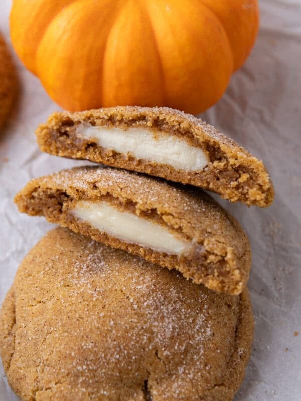 Pumpkin Cheesecake Cookies stacked on each other