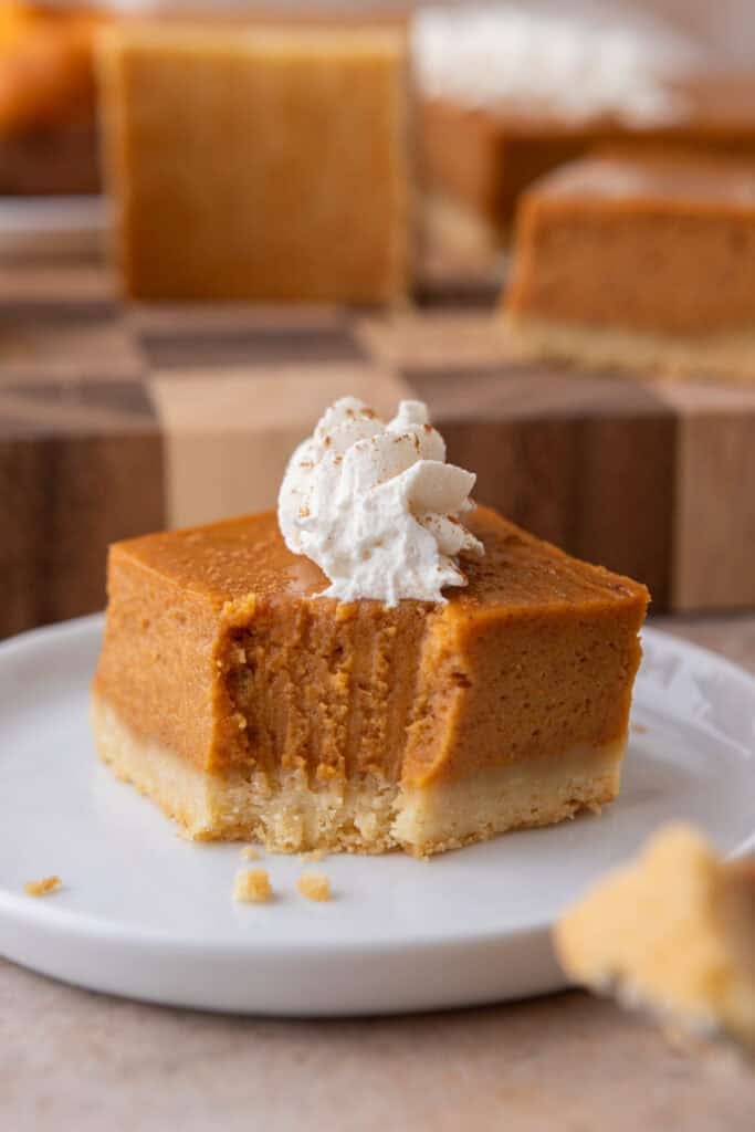 sweet potato pie bars recipe square with a bite taken out