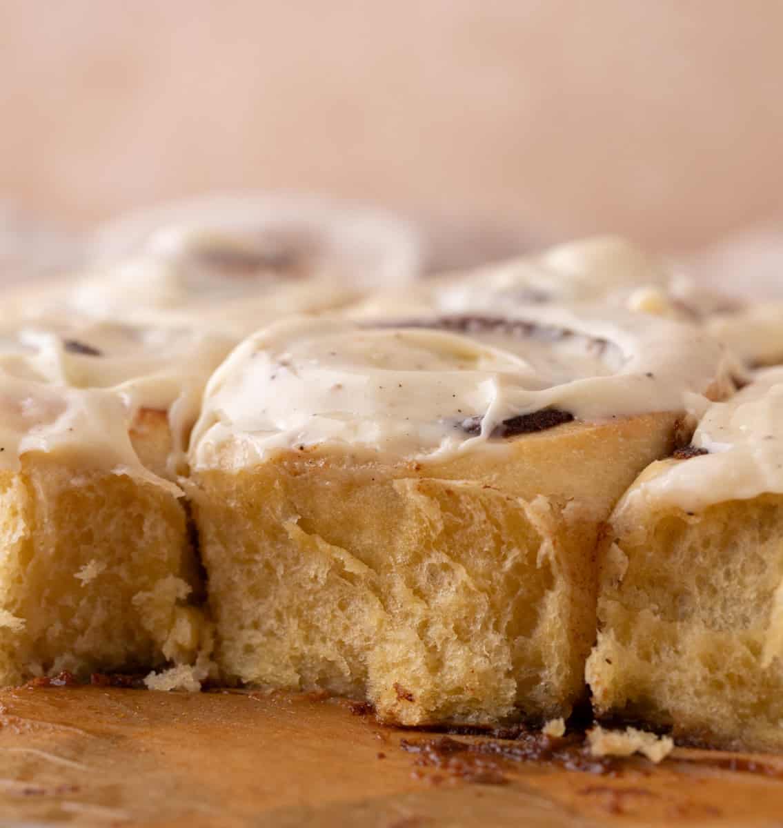 Showing the inside texture of the cut up cinnamon rolls