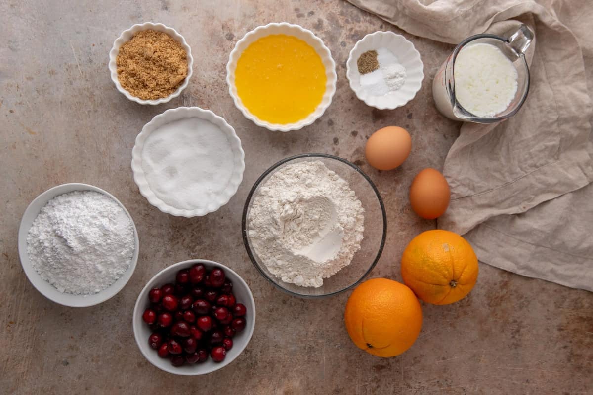 Ingredients for cranberry orange bread measured and arranged on counter