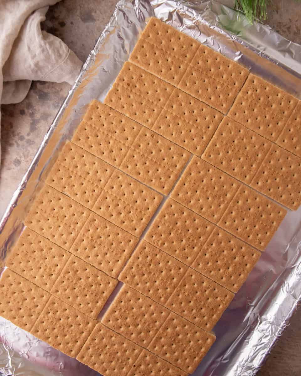 Cooked butter and brown sugar forming a smooth toffee mixture used in graham cracker Christmas crack.
