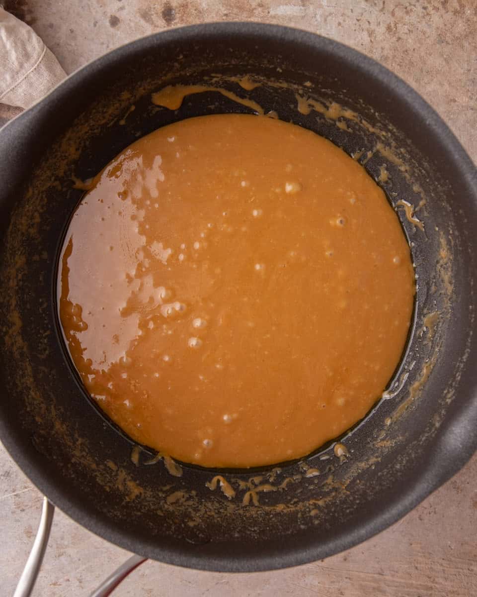 Melted brown sugar and butter toffee mixture in saucepan
