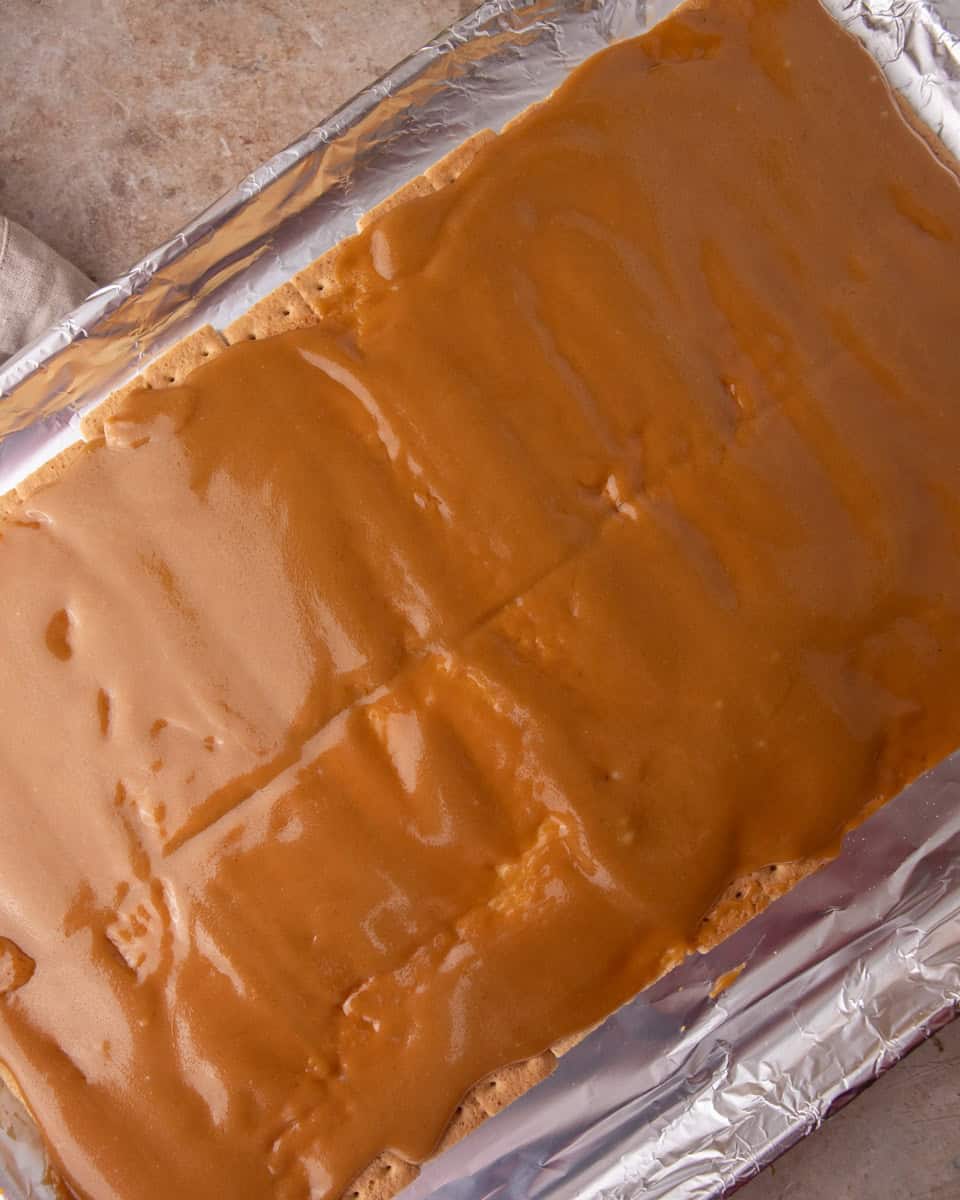 Toffee poured over graham crackers for Christmas crack
