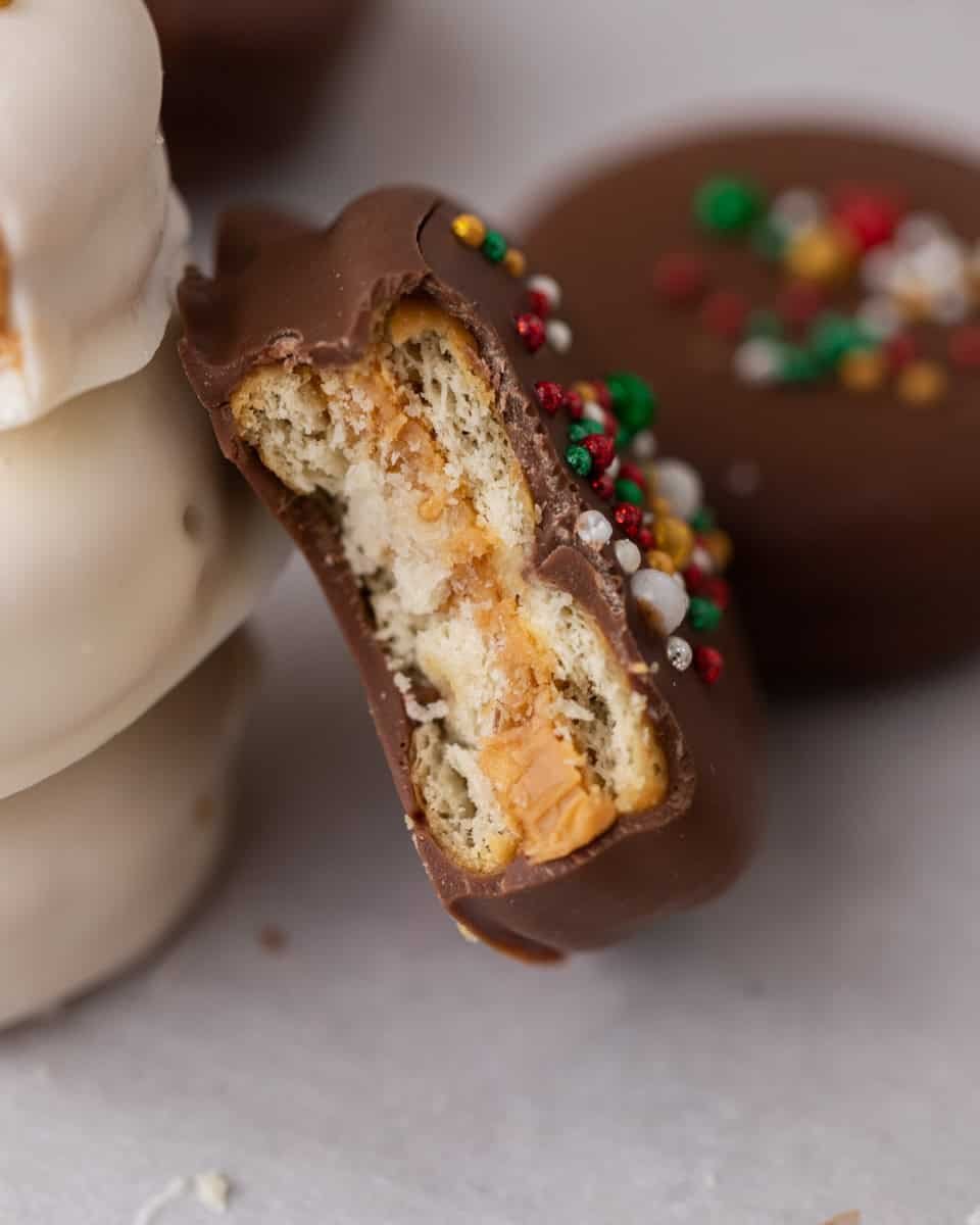 Close up of Ritz cookie with a bite taken out of it.