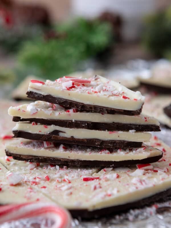 Close-up of classic peppermint bark stacked with candy cane pieces.
