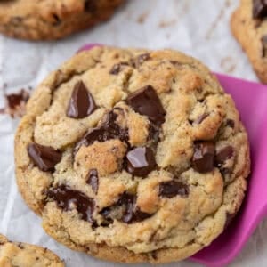 Baked cream cheese chocolate chip cookie with thick center and crisp edges