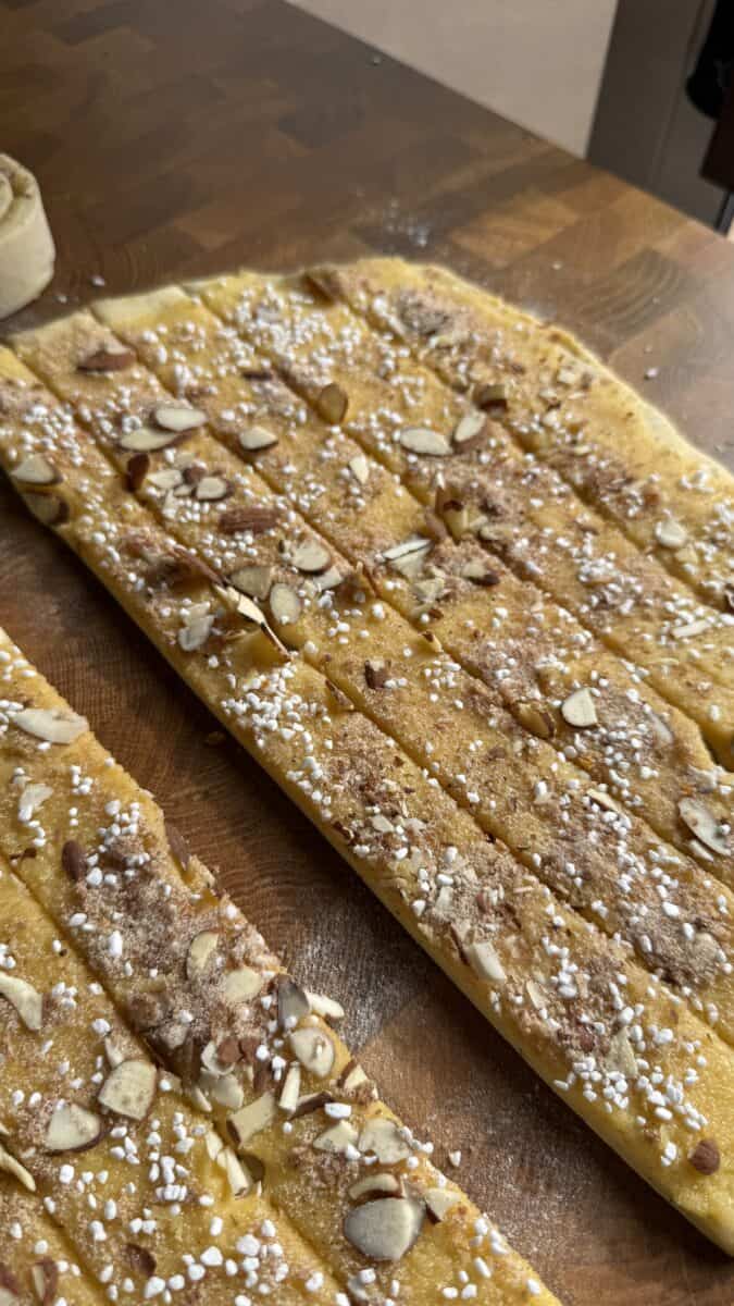 Rolling chilled cinnamon roll dough into a rectangle