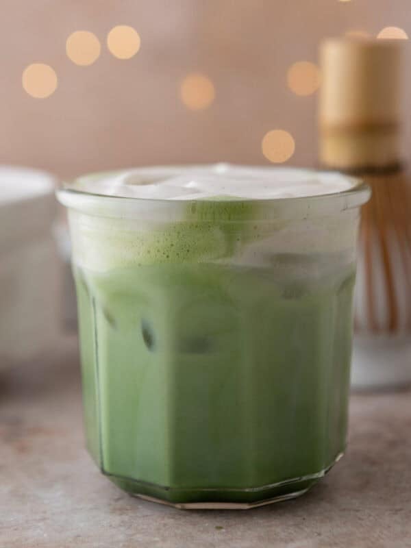 Salted maple matcha latte topped with cold foam and ice