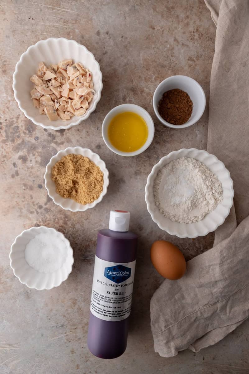 Ingredients for a single serve red velvet cookie on a countertop