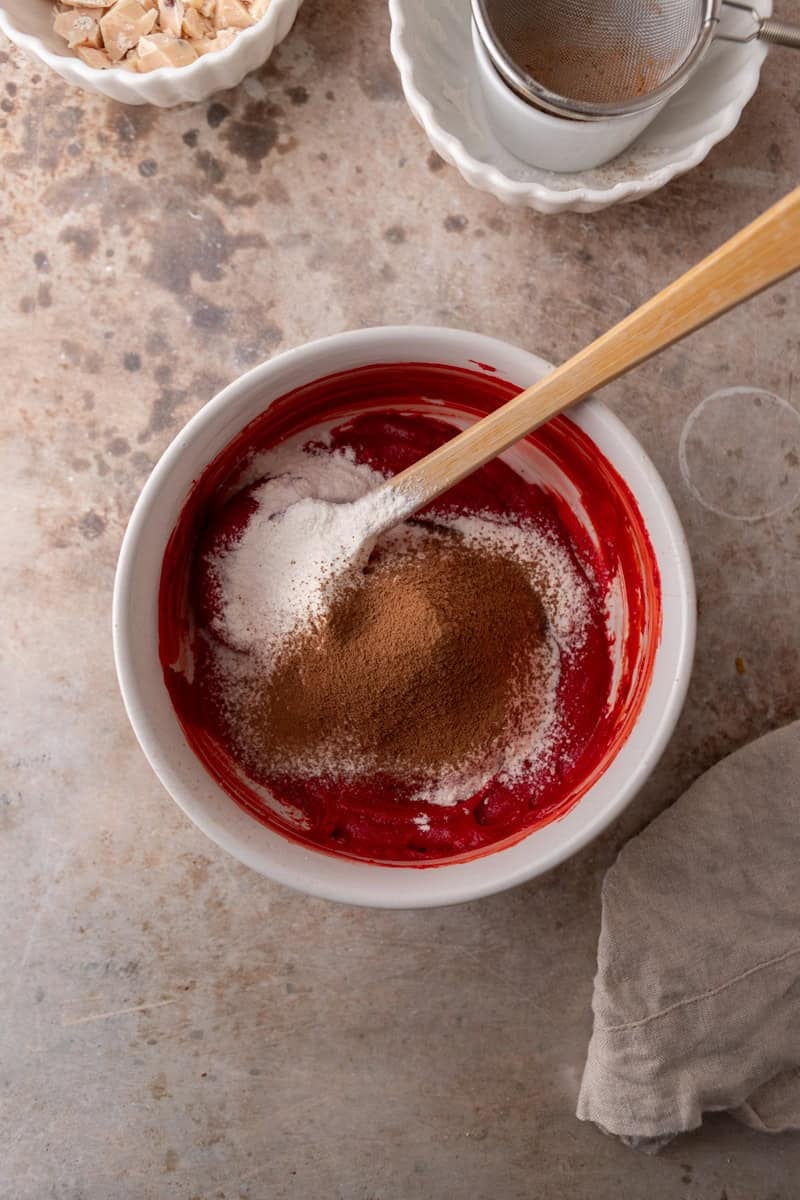 Flour and cocoa powder added to cookie dough