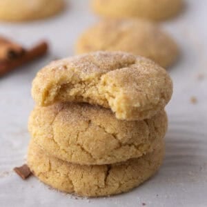 Soft and chewy small-batch snickerdoodle cookies stacked with cinnamon sugar coating