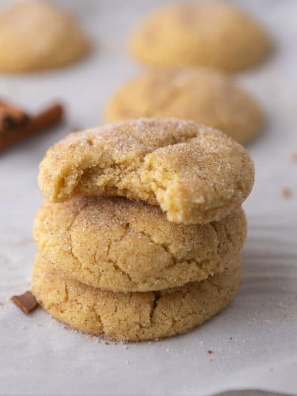 Soft and chewy small-batch snickerdoodle cookies stacked with cinnamon sugar coating