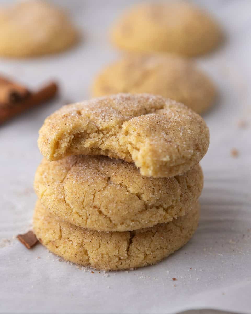 Soft and chewy small-batch snickerdoodle cookies stacked with cinnamon sugar coating
