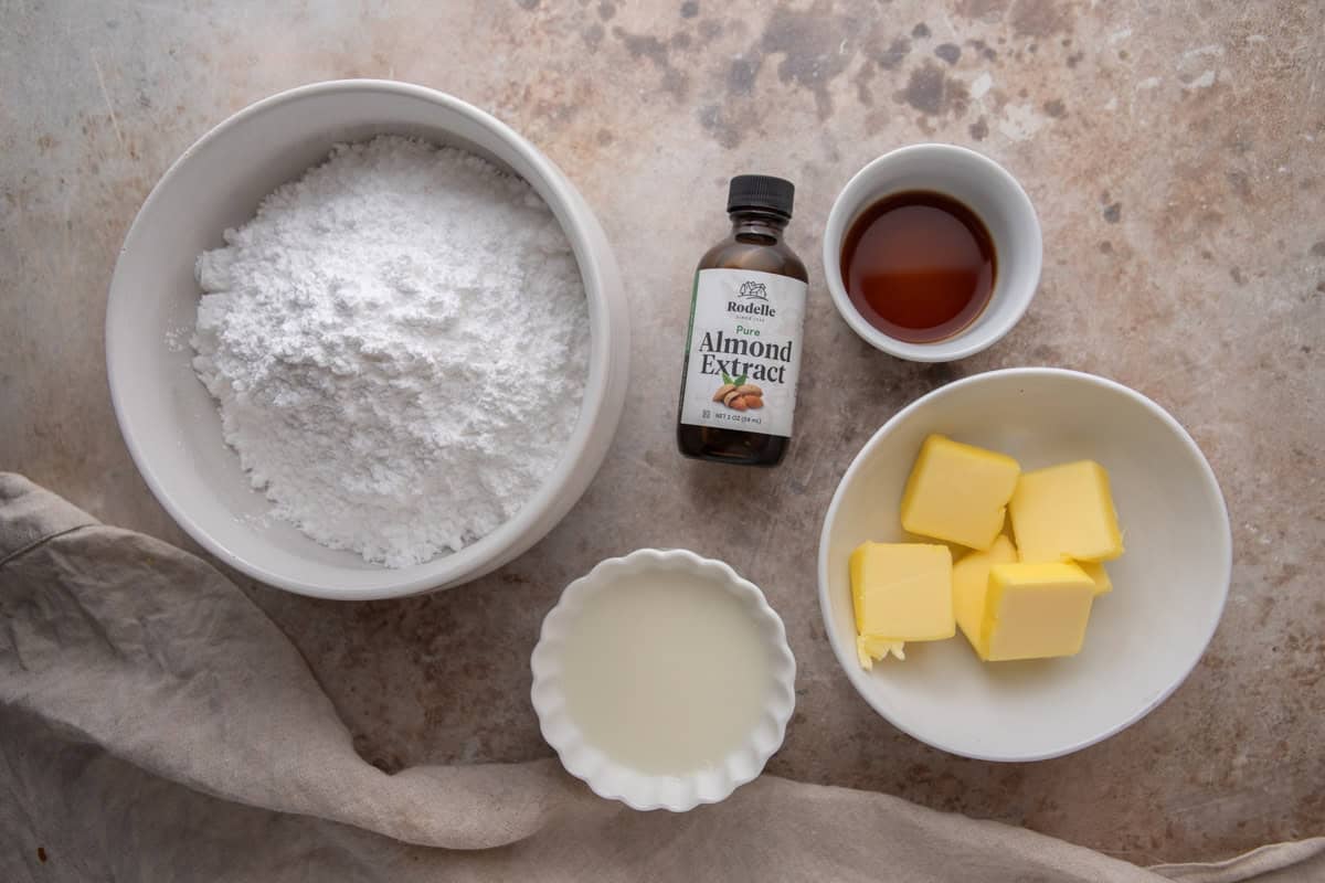 Almond glaze and slivered almonds on the counter