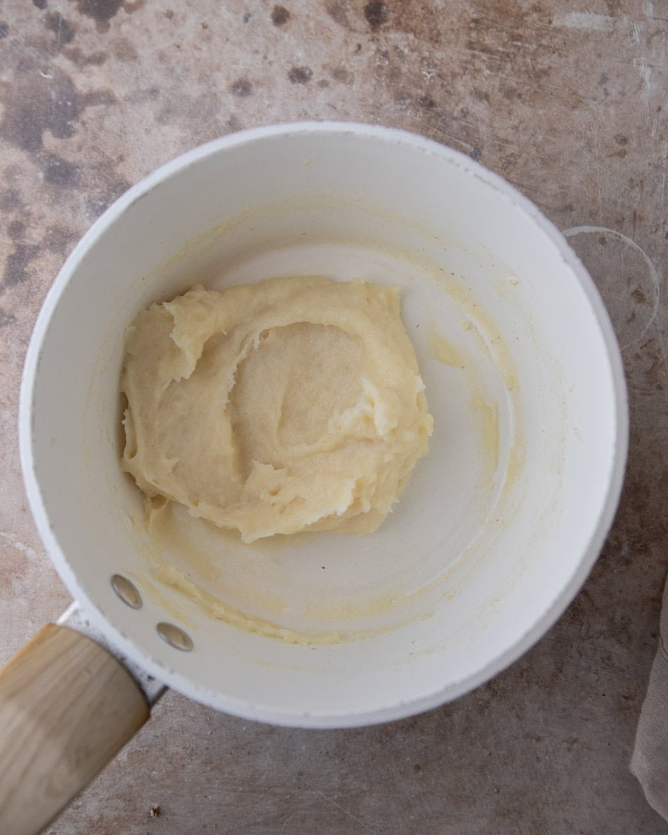 Cooked tangzhong mixture in a pan after it gelatinizes.