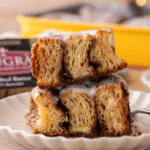 Croissant cinnamon rolls showing flaky laminated layers with cinnamon filling and glaze